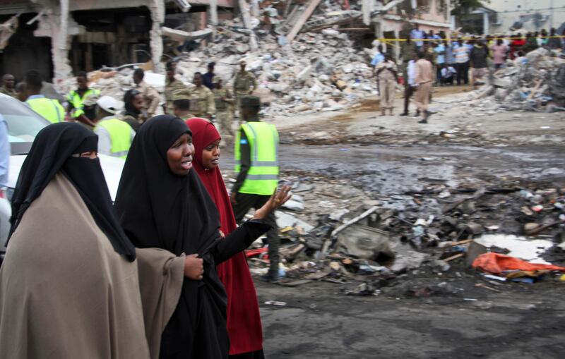 Somali women react at the scene of Saturday's blast. Farah Abdi Warsameh / AP Photo