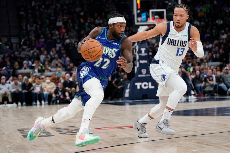 Minnesota Timberwolves' Patrick Beverley, left, drives past Jalen Brunson of the Dallas Mavericks during an NBA game in March 2022. AP The two sides will play each toehr twice in Abu Dhabi in October 2023. AP
