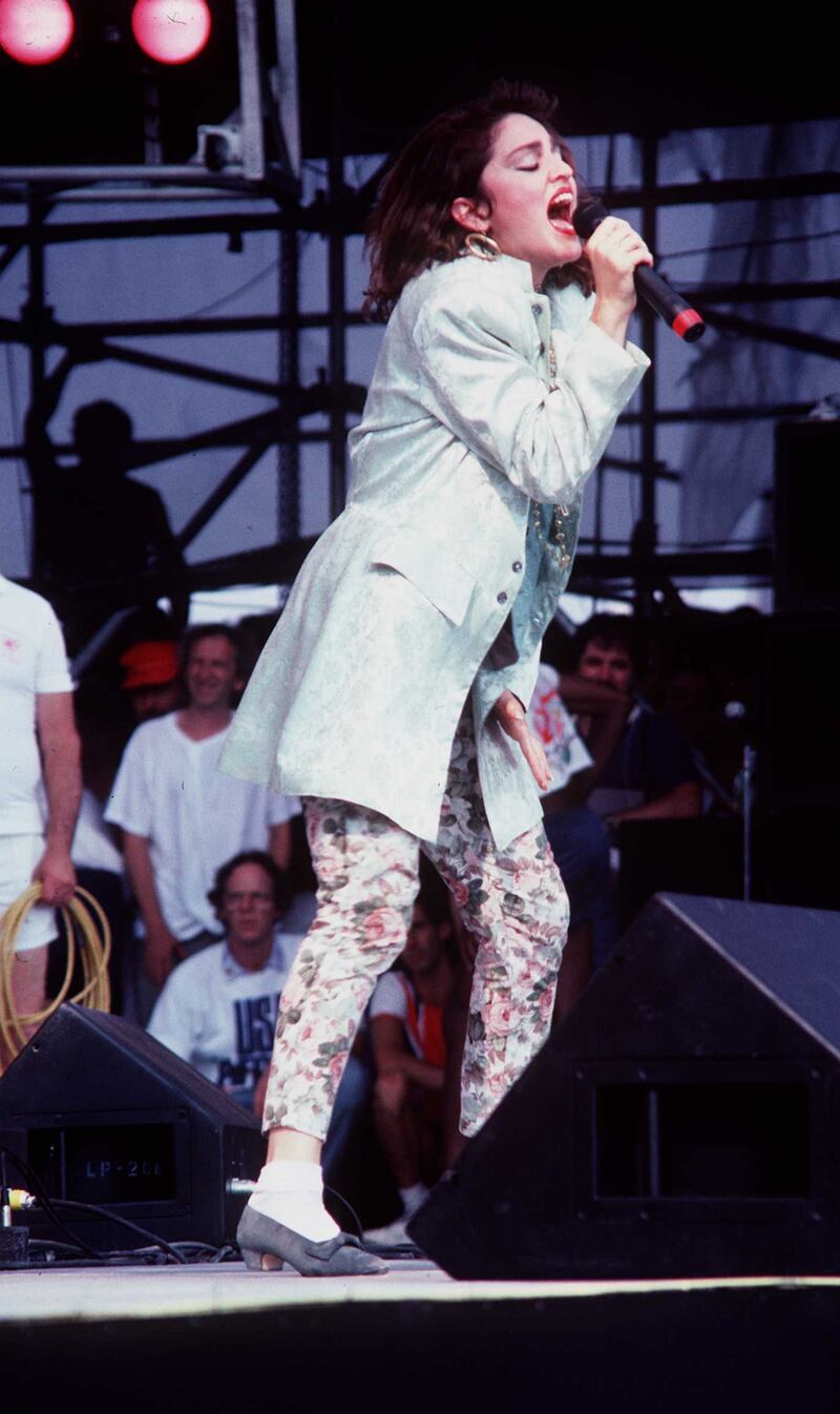 1985 Madonna performs at the Live Aid concert.