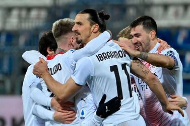 AC Milan's Swedish forward Zlatan Ibrahimovic celebrates after scoring his second goal during the Italian Serie A football match Cagliari vs AC Milan on January 18, 2021 at the Sardegna Arena in Cagliari. / AFP / Alberto PIZZOLI