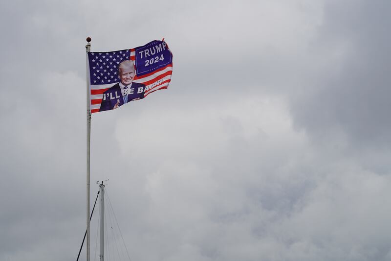 A Trump 2024 flag flies above a dock on Tangier Island. Former president Donald Trump is extremely popular on the island.