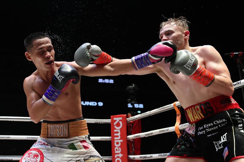 Sunny Edwards (black shorts) takes on Jayson Mama (white shorts) in the IBF World Flyweight title at the Coca-Cola Arena, Dubai. Chris Whiteoak/ The National