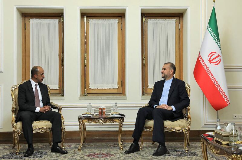 Iran Foreign Minister Hossein Amir-Abdollahian, right, with Bader Abdullah Al Munaikh, Kuwait's new ambassador to Iran, in Tehran.  AFP