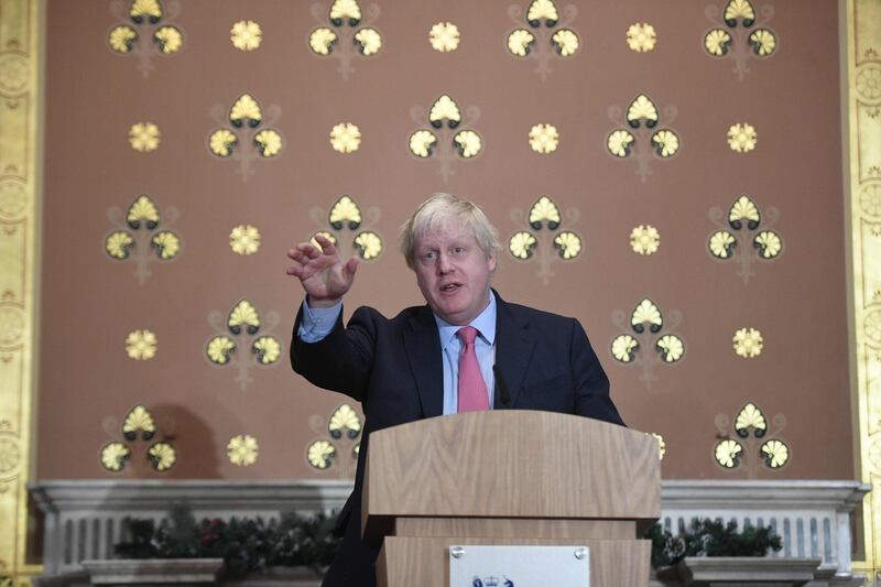 Britain's Foreign Secretary Boris Johnson presents a speech on Islamist terrorism to an audience of academics, diplomats and members of the media at the Foreign Office in London on December 7, 2017.  / AFP PHOTO / POOL / Victoria Jones