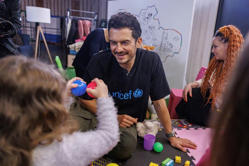 Actor and Unicef Goodwill Ambassador Orlando Bloom plays with children in the Spilno Child Centre in Kyiv on March 25. Unicef / Reuters