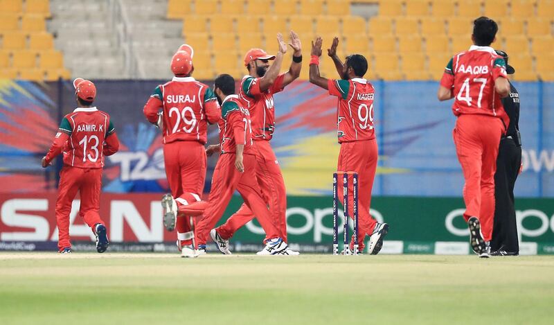Oman celebrate are well placed at the T20 World Cup Qualifier having won three of their four matches so far. Courtesy Abu Dhabi Sports Council.