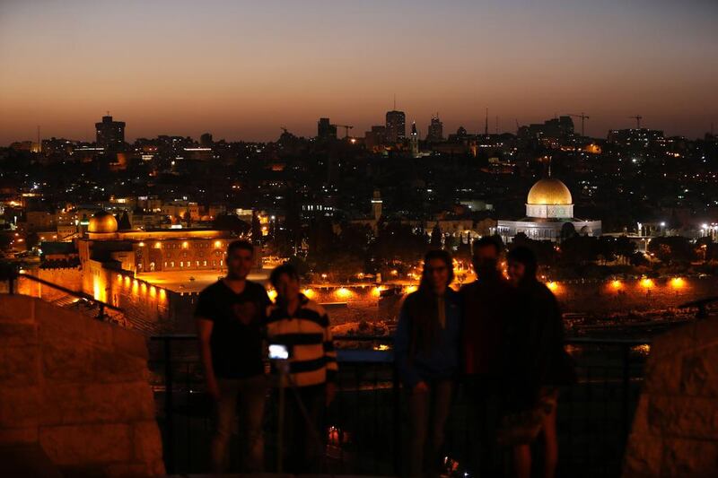 The Dome of the Rock (R) and the Al Aqsa Mosque (L) at the Al Aqsa Mosque compound in Jerusalem's Old City. Ahmad Gharabli / AFP 

