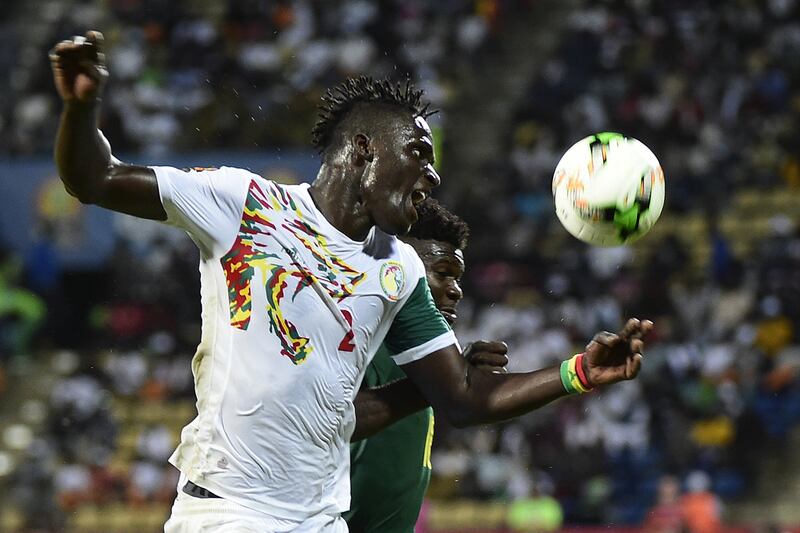 Senegal's defender Kara Mbodji, left. Khaled Desouki / AFP