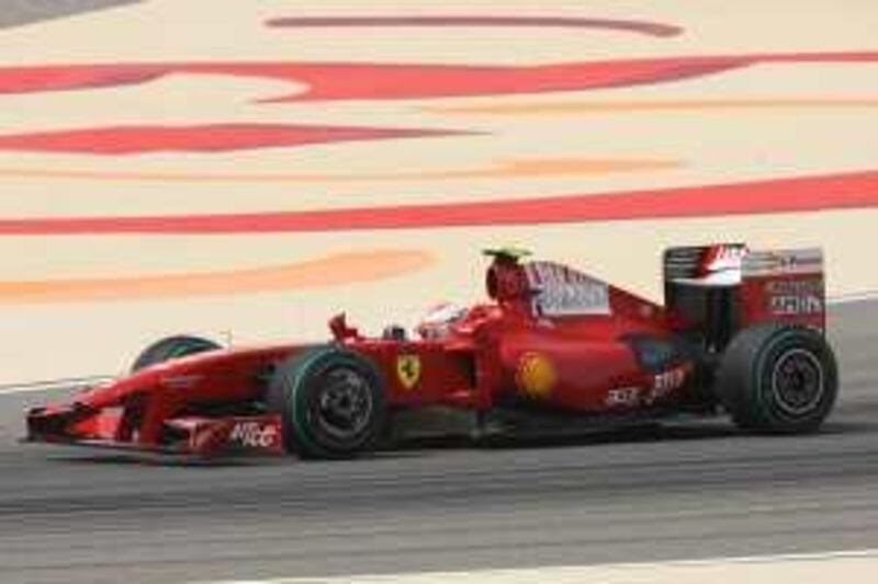 BAHRAIN .25th April. 2009 .Kimi Raikkonen  in action for Ferrari during qualifying round at the Bahrain Grand Prix. Stephen Lock  /  The National. POSS OASIS *** Local Caption ***  SL-pits-018.jpg