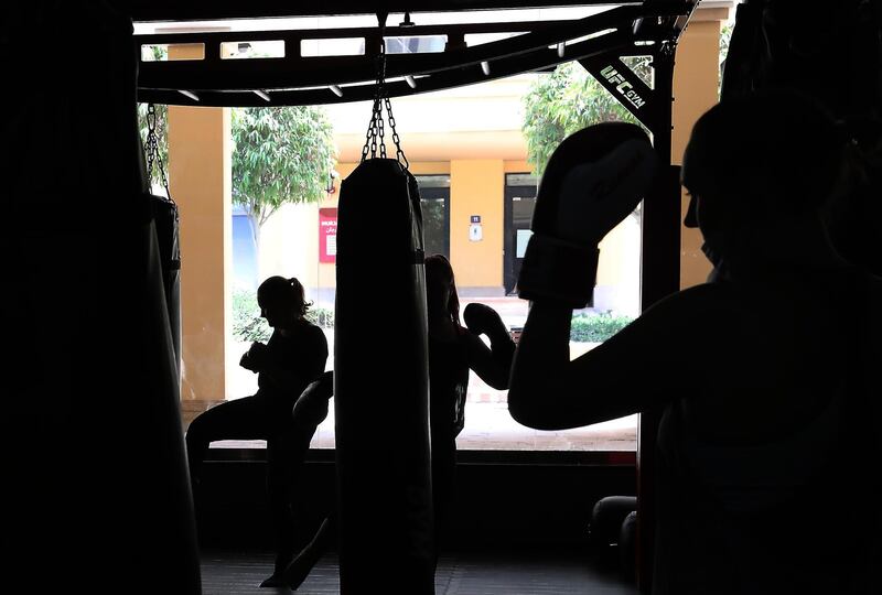 DUBAI, UNITED ARAB EMIRATES , August 10 – 2020 :- Participants during the Kick boxing session at the UFC Gym in Murjan 6 in Jumeirah Beach Residence in Dubai. They are taking part in the 90 minutes MMA Mash up. (Pawan Singh / The National) For News/Online/Instagram. Story by Nick Webster