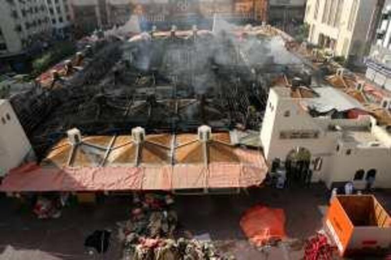 DUBAI - April 2, 2008 -  More than 100 shops in Naif Market in Deira were gutted in a fire due to an electrical short circuit by air-conditioning unit early Wednesday morning. ( Paulo Vecina / The National ) *** Local Caption *** na14 souk fire2.jpg