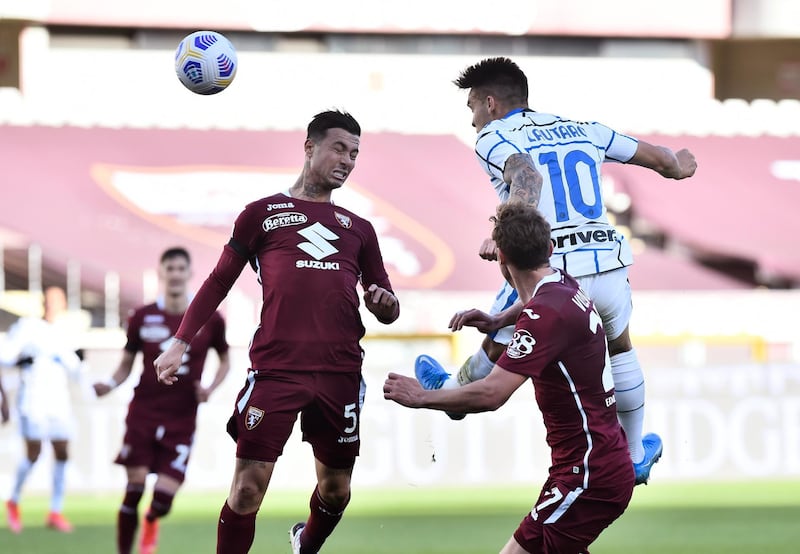 Lautaro Martinez heads home Inter Milan's second goal in their 2-1 Serie A win at Torino on Sunday, March 14. Reuters