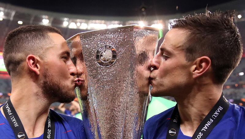 File photo dated 29-05-2019 of Chelsea's Eden Hazard (left) and Cesar Azpilicueta celebrate with the trophy after the UEFA Europa League final at The Olympic Stadium, Baku, Azerbaijan. PA Photo. Issue date: Monday March 23, 2020. The men’s and women’s Champions League finals and Europa League final, scheduled for May 2020, have been postponed due to the coronavirus pandemic, UEFA has announced. See PA story SPORT Coronavirus. Photo credit should read Adam Davy/PA Wire.