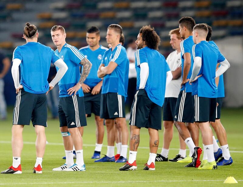 Real Madrid's Toni Kroos (second left) attends a training session at Zayed Sports City stadium in Abu Dhabi. EPA