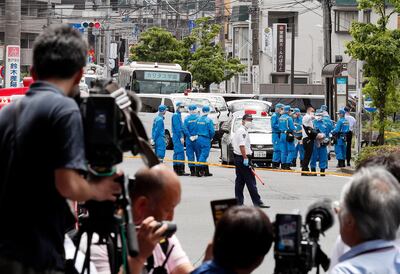 epaselect epa07606846 Police investigate the site of a mass stabbing in Kawasaki, near Tokyo, Japan, 28 May 2019. According to media reports, 16 people, including elementary school children, were stabbed by a man on 28 May before stabbing himself.  EPA/KIMIMASA MAYAMA