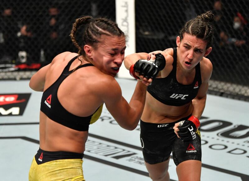 ABU DHABI, UNITED ARAB EMIRATES - JANUARY 23: (R-L) Marina Rodriguez of Brazil punches Amanda Ribas of Brazil in a strawweight fight during the UFC 257 event inside Etihad Arena on UFC Fight Island on January 23, 2021 in Abu Dhabi, United Arab Emirates. (Photo by Jeff Bottari/Zuffa LLC)