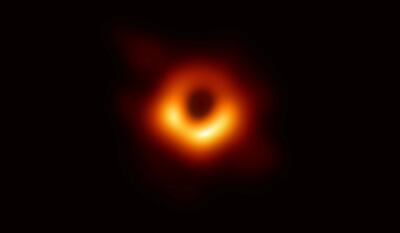 REFILE - CORRECTING SPELLING The first ever photo of a black hole, taken using a global network of telescopes, conducted by the Event Horizon Telescope (EHT) project, to gain insight into celestial objects with gravitational fields so strong that no matter or light can escape, is shown in this handout released April 10, 2019.  Event Horizon Telescope (EHT)/National Science Foundation/Handout via REUTERS   ATTENTION EDITORS - THIS IMAGE WAS PROVIDED BY A THIRD PARTY.  NO RESALES. NO ARCHIVE.