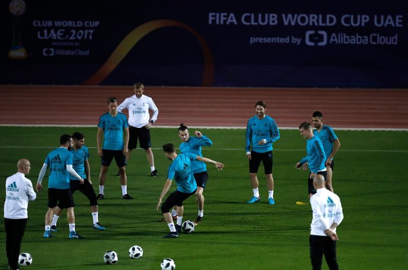 Real Madrid players train during a training session in Abu Dhabi. Hassan Ammar / AP Photo