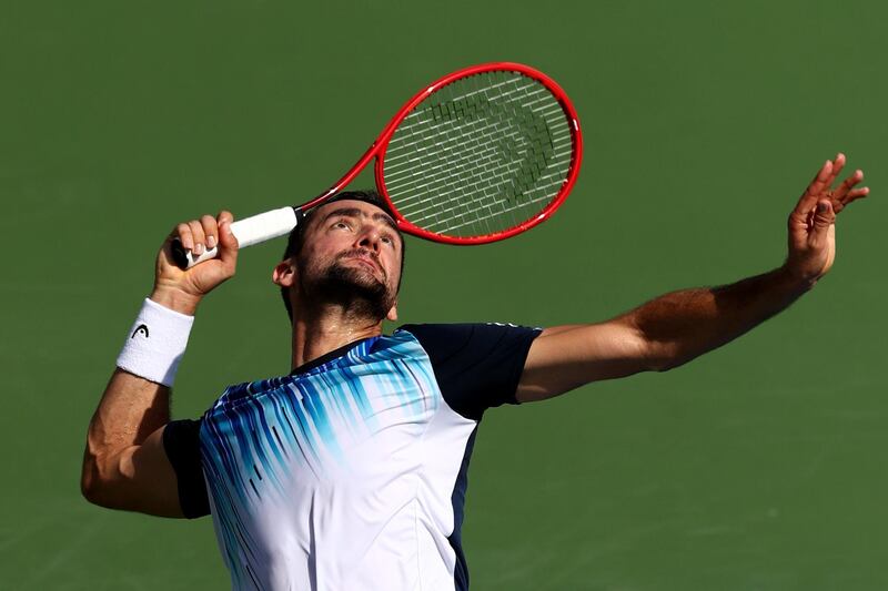 Marin Cilic serves against Benoit Paire. Getty
