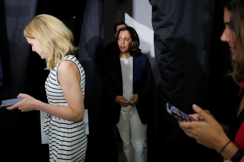 Democratic 2020 U.S. presidential candidate and U.S. Senator Kamala Harris (D-CA) walks out to talk to reporters after a campaign stop in Somersworth, New Hampshire, U.S., July 14, 2019.   REUTERS/Brian Snyder