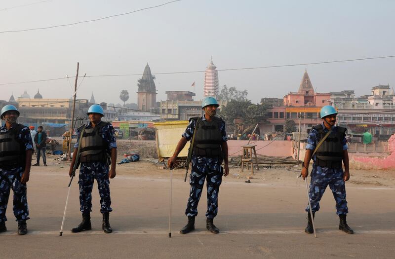 Security officers stand guard in Ayodhya, India. AP Photo