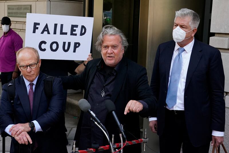 Mr Bannon speaks to reporters after leaving US District Court in Washington. Reuters