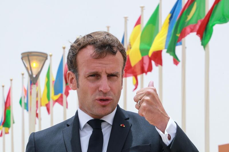 French President Emmanuel Macron speaks to the press upon his arrival at Nouakchott-Oumtounsy International Airport, in Nouakchott, Mauritania, 30 June. EPA