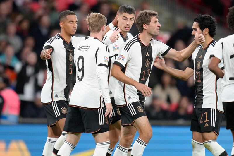 Kai Havertz, third from left, celebrates with his teammates. AP