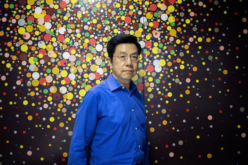 Kai-Fu Lee, founder of Sinovation Ventures, poses for a photograph in Beijing, China, on Tuesday, Aug. 15, 2017. Sinovation Ventures' latest growing endeavor, an in-house AI Institute, has about 30 full-time employees with plans to grow headcount to about a hundred within the year. Photographer: Giulia Marchi/Bloomberg
