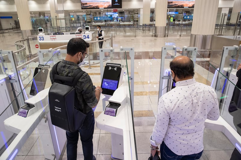 Close to six million passengers have passed through the smart gates at Dubai International Airport during the first seven months of this year. All photos: Antonie Robertson / The National
