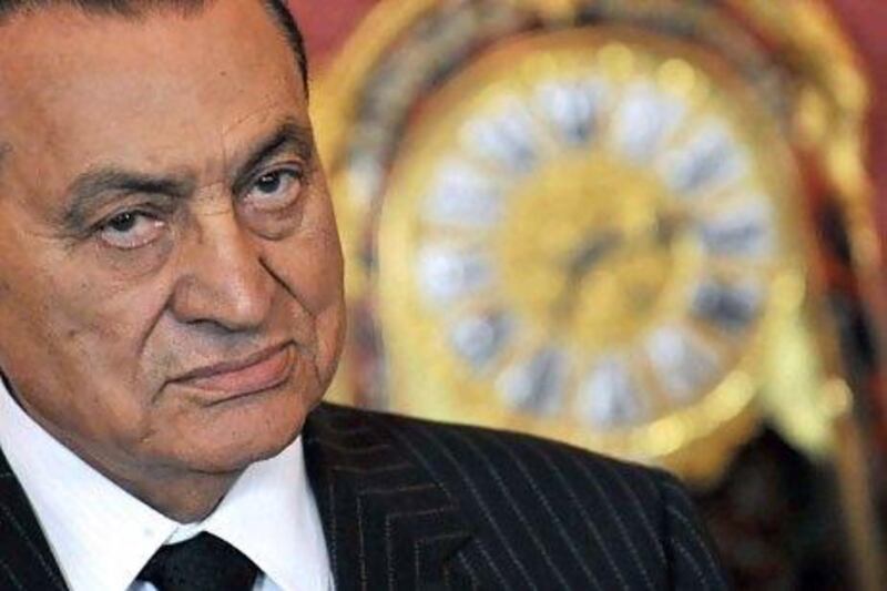 (FILES) -- A file picture dated October 13, 2009 shows Egyptian President Hosni Mubarak giving a statement for the press with his Hungarian counterpart Laszlo Solyom (not pictured) in Budapest after their official talks. Mubarak said in a televised speech on February 10, 2011 that he would hand over power to his deputy and former intelligence chief Omar Suleiman. AFP PHOTO / ATTILA KISBENEDEK

 *** Local Caption *** 259044-01-08.jpg