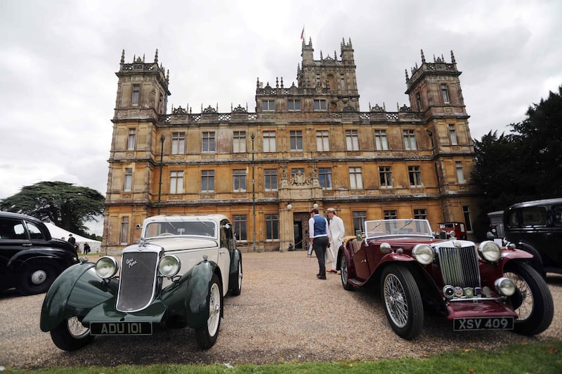 Visitors attend a 1920s themed event at Highclere Castle, near Newbury, west of London, on September 7, 2019, ahead of the world premiere of the Downton Abbey film. AFP