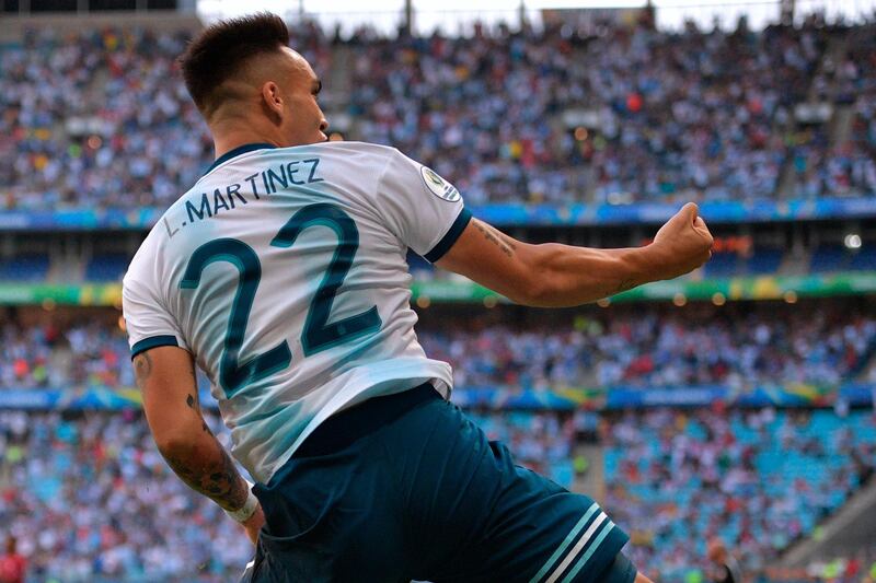 Argentina's Lautaro Martinez celebrates after scoring against Qatar. AFP