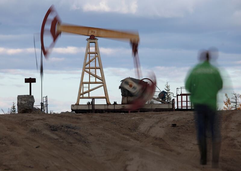 An oil pump jack. Higher interest rates could slow the global economy and dampen crude demand. AP