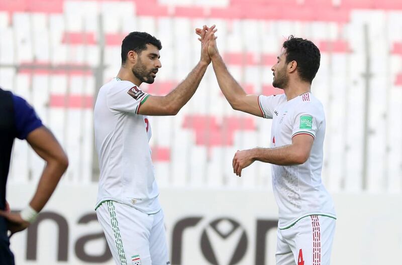 Iranian players celebrate during their 10-0 victory over Cambodia in a Group C World Cup qualifier at the Bahrain National Stadium, in Riffa, Bahrain. AFC