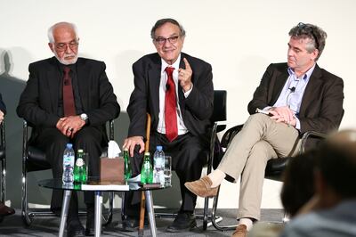 From left, Omara Khan Massoudi, former director of the National Museum of Afghanistan; Omar Sultan, former deputy minister for culture in Afghanistan; and Robert Parthesius, director of the Dhakira Centre for Heritage Studies and associate professor of heritage studies, at an NYUAD event in 2014. Photo: NYUAD