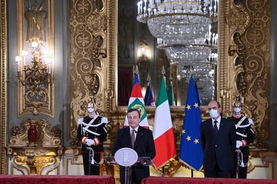 Mario Draghi, Italy's prime minister-designate, left, speaks at a news conference following a meeting with Italy's President Sergio Mattarella in Rome, Italy, on Friday, Feb. 12, 2021. Draghi agreed to take over as Italy’s next prime minister, naming his ministers as he prepares to head a new government that will prioritize the pandemic, a struggling economy and moving ahead with European integration. Photographer: Alessandro Di Meo/ANSA/Bloomberg