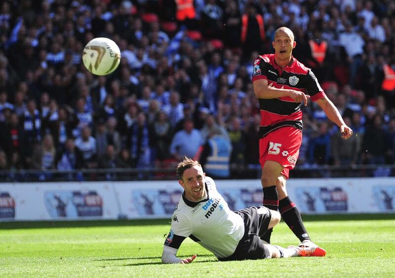 Bobby Zamora scores the winner for Queens Park Rangers at Wembley Stadium on Saturday. Carl Court / AFP