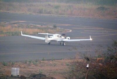 This photo released by Conflict Armament Research taken in Feb. 2017 is said by them to show a Diamond DA42 surveillance aircraft at the international airport in Juba, South Sudan. The Conflict Armament Research report released Thursday, Nov. 29, 2018, says Uganda diverted European weapons to South Sudan's military despite an EU arms embargo and asks how a U.S. military jet ended up deployed in South Sudan in possible violation of arms export controls. (Conflict Armament Research via AP)