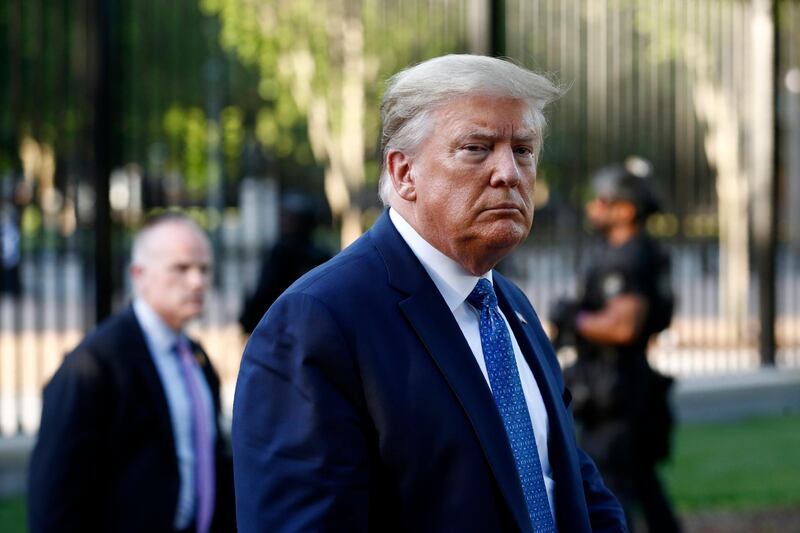 FILE - In this Monday, June 1, 2020, file photo, President Donald Trump returns to the White House in Washington. Trump is traveling to Maine on Friday, June 5, 2020, to visit a company that makes specialized swabs for coronavirus testing. (AP Photo/Patrick Semansky, File)