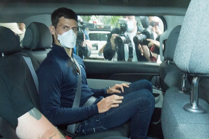 Serbian tennis player Novak Djokovic leaves the Park Hotel in Melbourne on January 16 after his visa to play in the Australian Open was cancelled for a second time. EPA
