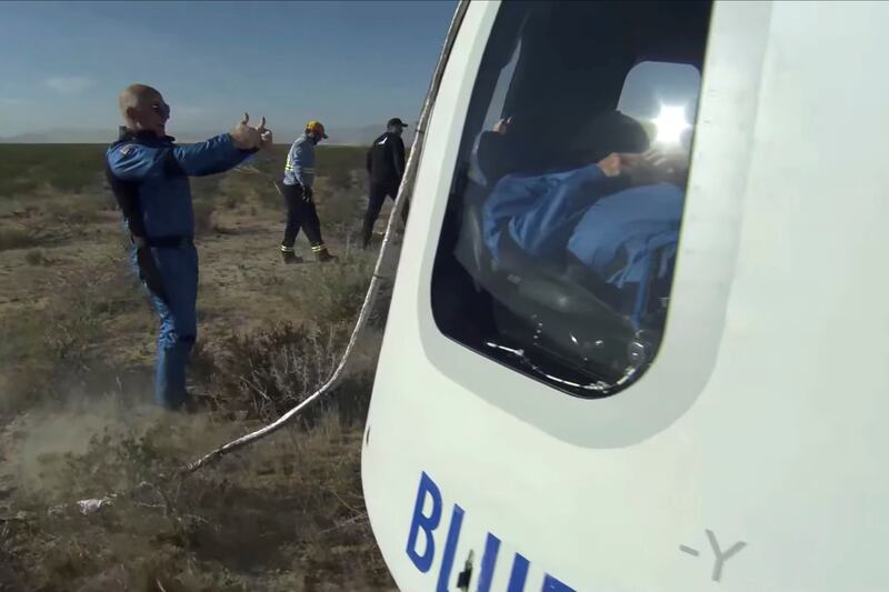 Billionaire Jeff Bezos welcomes the four passengers on Blue Origin’s New Shepard mission NS-18 after landing near Van Horn, Texas. Reuters