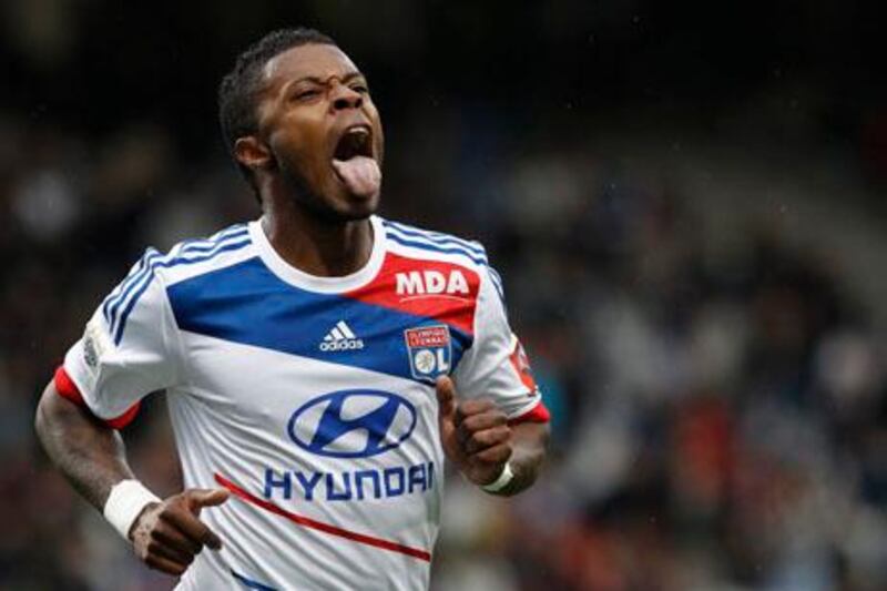 Lyon's Michel Bastos, of Brazil, reacts during their French League One soccer match against Valenciennes at Gerland stadium, in Lyon, central France, Saturday, Sept. 1, 2012. (AP Photo/Laurent Cipriani)
