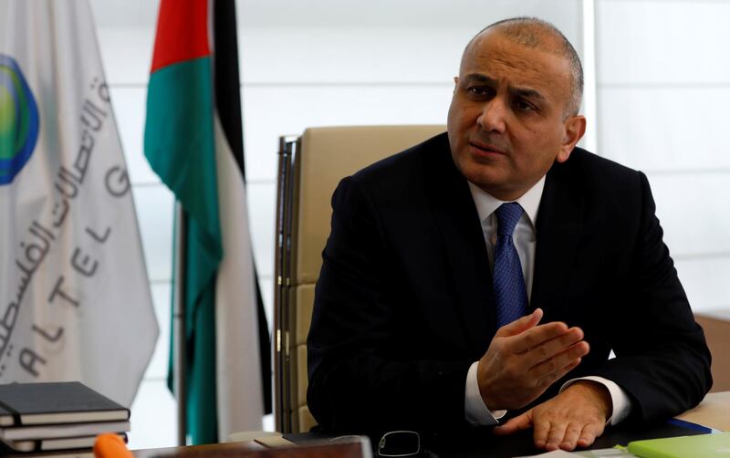 Ammar Aker, Chief Executive Officer at Palestine Telecommunications (Paltel) Group, gestures during an interview with Reuters in his office in the West Bank city of Ramallah January 24, 2018. REUTERS/Mohamad Torokman