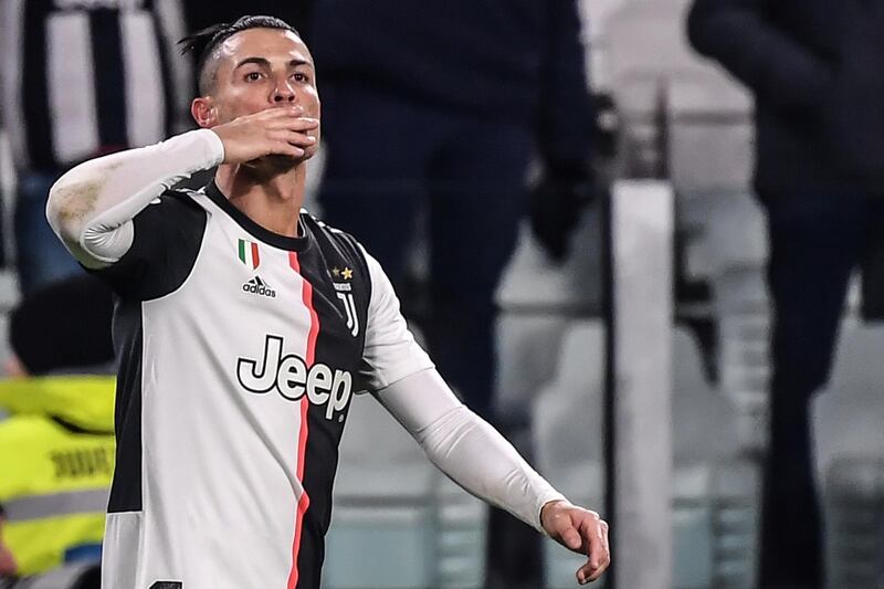 Juventus' Portuguese forward Cristiano Ronaldo celebrates after scoring his second goal during the Italian Serie A football match Juventus vs Parma on January 19, 2020 at the Juventus stadium in Turin. (Photo by Marco Bertorello / AFP)