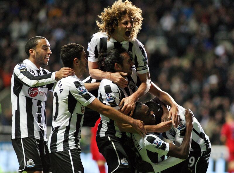 Newcastle United's Sammy Ameobi, second right, celebrates his goal with his teammates during their English Premier League soccer match against  West Bromwich Albion at St James' Park, Newcastle, England, Sunday, Oct. 28, 2012. (AP Photo/Scott Heppell) *** Local Caption ***  Britain Soccer Premier League.JPEG-064fd.jpg