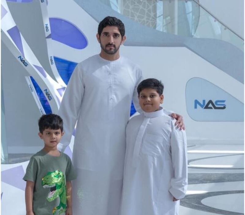 Sheikh Hamdan bin Mohammed, Crown Prince of Dubai, meets young fan Abdullah Hussain (right) and his brother.