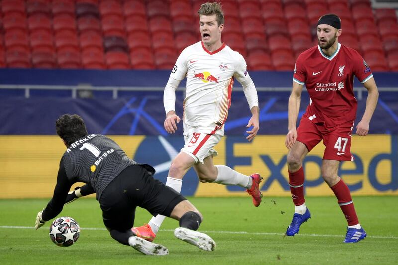 LIVERPOOL RATINGS: Alisson Becker 6 - The Brazilian made a great save from Olmo at a time Leipzig could have clawed their way back into the game. Used the ball well and directed the defence capably. EPA