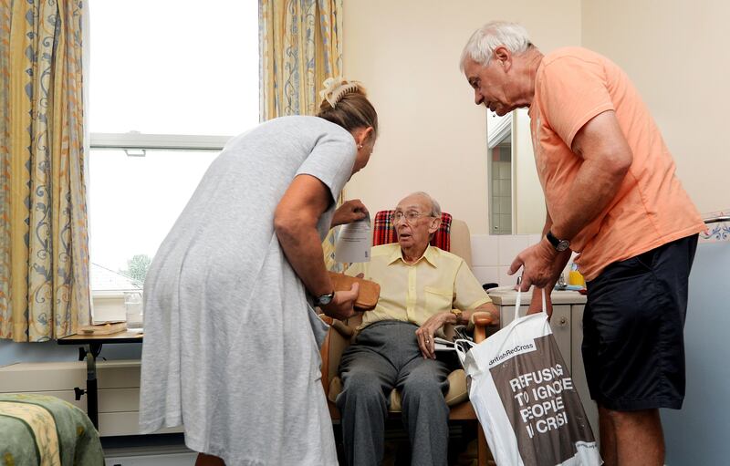 The UK government's policy to release elderly people into care homes has been ruled unlawful. EPA