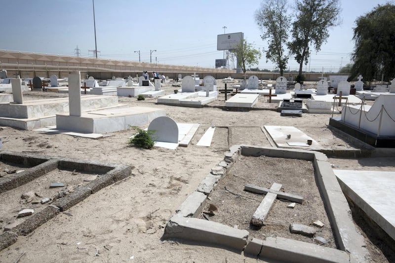 ABU DHABI, UNITED ARAB EMIRATES - Tombs at Sas Al Nakhel Cemetery, Non Muslim.  Ruel Pableo for The National for John Dennehy's story